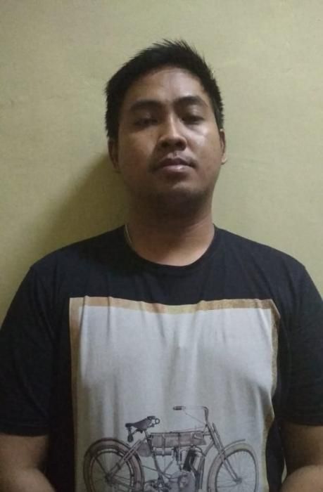 podiumnews.com-Pande Anom Pelaku Aniaya Wakil Bendesa Digelandang Polisi